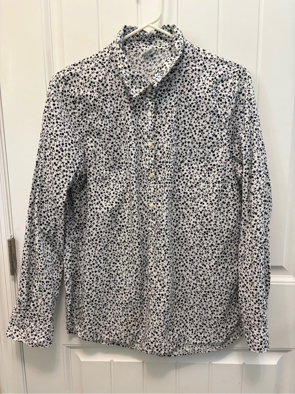 GAP White button front with Black Micro Floral Print. Woman’s size Medium.